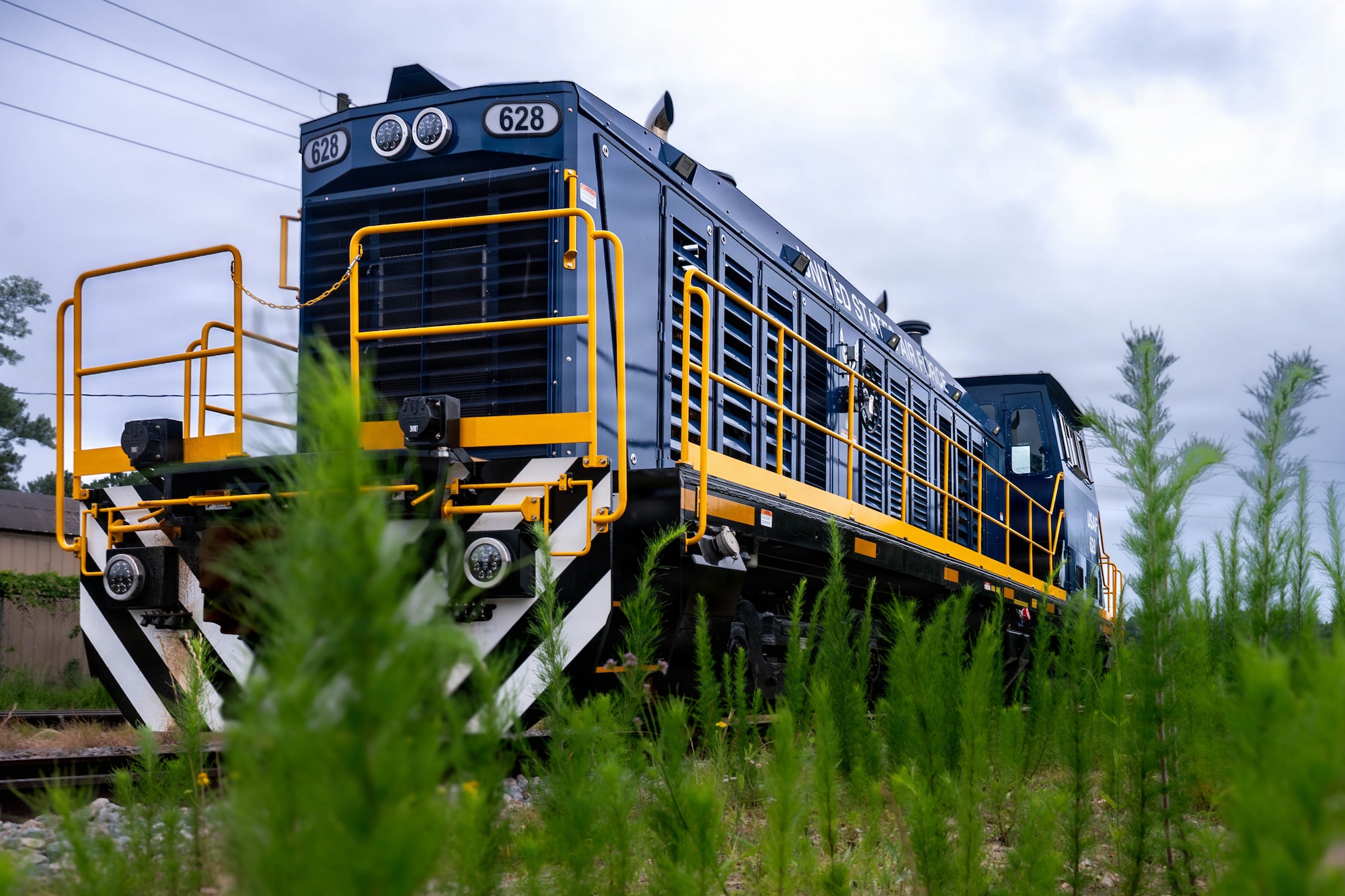 A photo of a locomotive sitting idle.