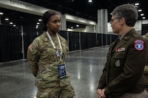Brig Gen Sara Dudley, USARD commanding general speaking with U.S. Army Soldier at SkillsUSA