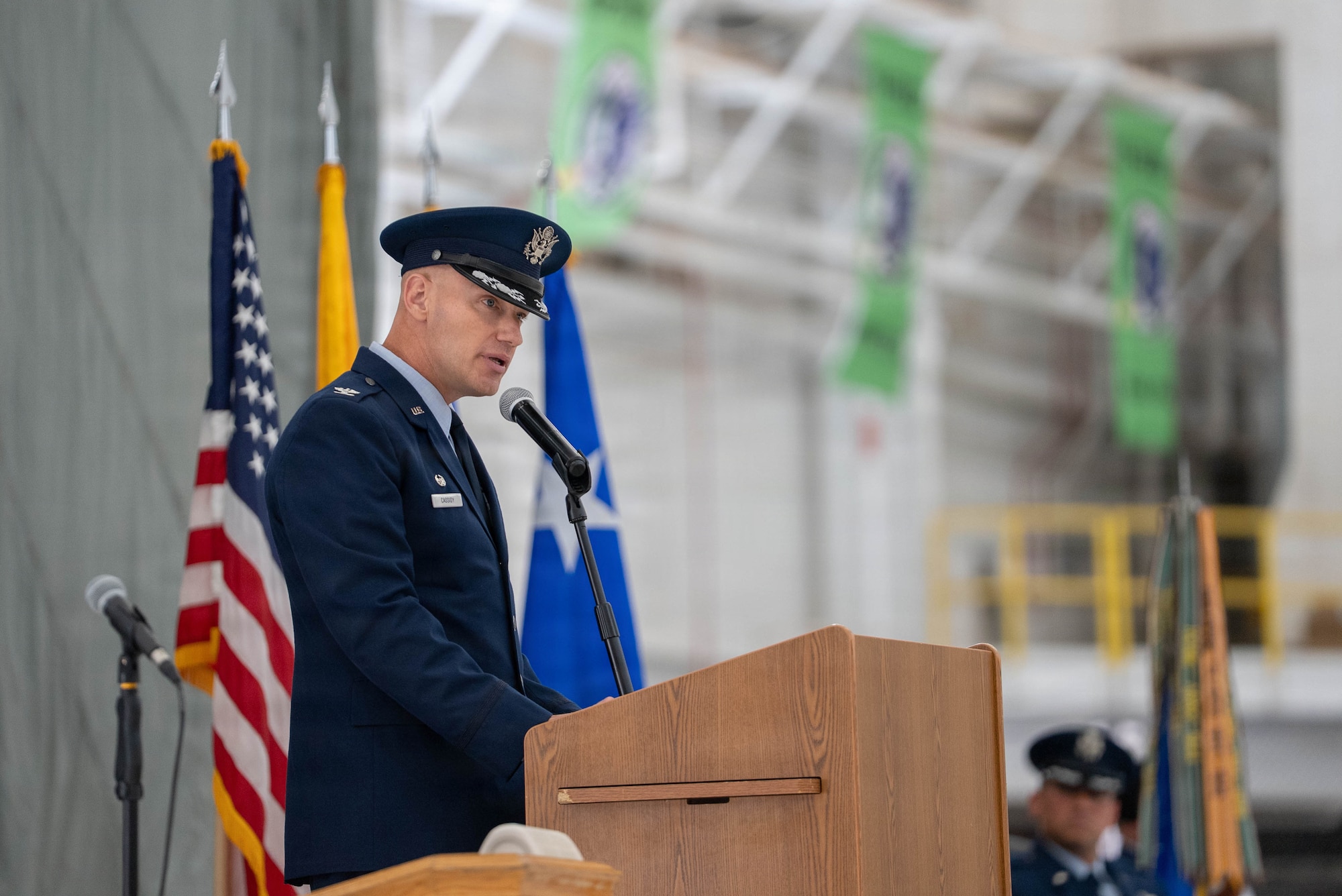 U.S. Air Force Col. Brett Cassidy, commander of the 27th Special Operations Wing, gives remarks during a change of command ceremony at Cannon Air Force Base, New Mexico, June 18, 2026. Before assuming command of the 27th SOW, Cassidy served as commander of the 11th Air Task Force at Davis-Monthan Air Force Base, Arizona, where he helped validate the Air Force's new deployment model and demonstrated Agile Combat Employment in austere operating environments. (U.S. Air Force photo by Airman 1st Class Reagan Stout)