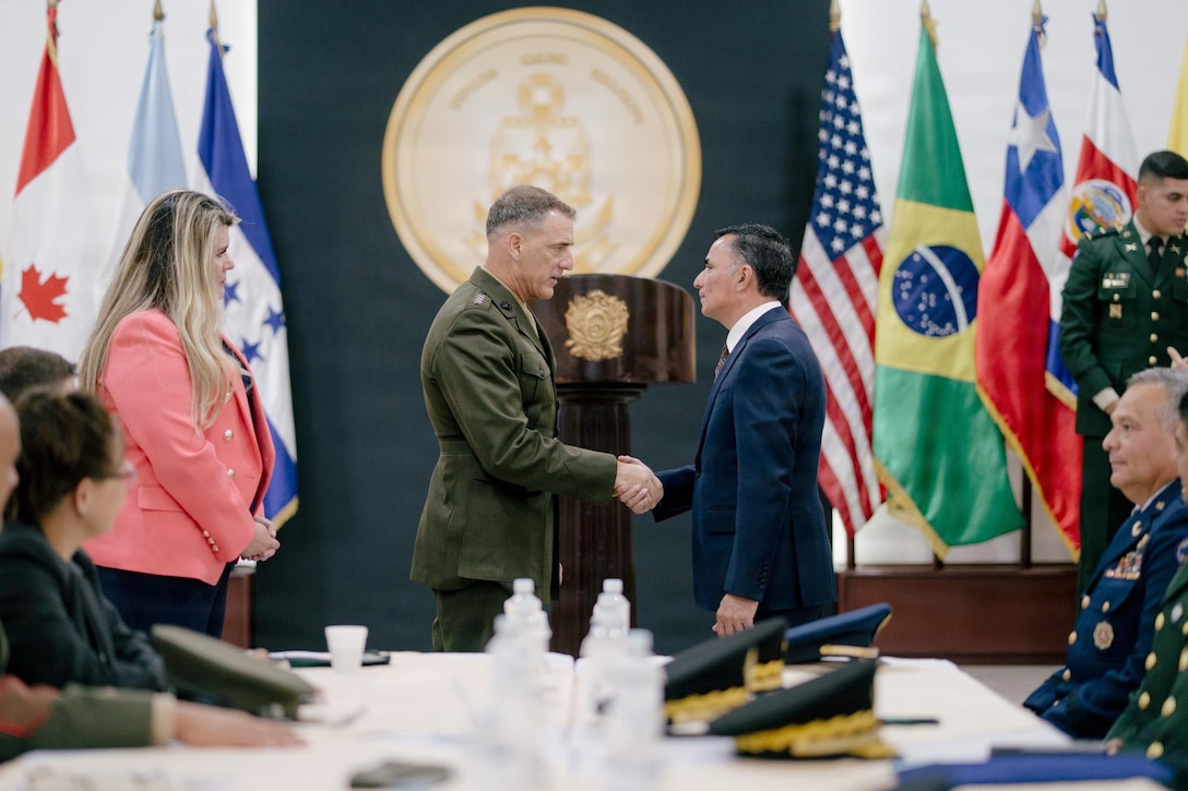 U.S. Marine Corps Gen. Francis L. Donovan, commander of U.S. Southern Command, greets Honduran Defense Minister Enrique Rodríguez Burchard