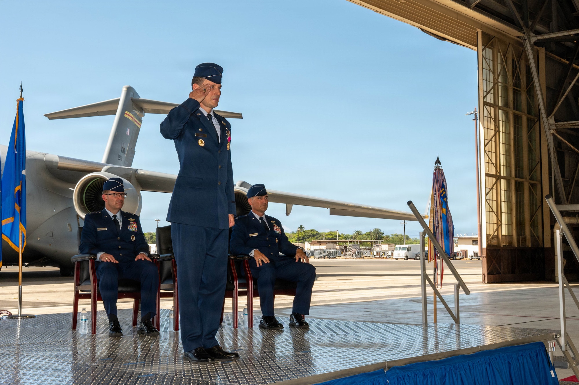 U.S. Air Force  Col. Garrett Fisher, outgoing 15th Wing commander, renders his last salute to the 15th Wing during the change of command ceremony at Joint Base Pearl Harbor-Hickam, Hawaii, June 18, 2026. Fisher relinquished command of the 15th Wing to Col. Kyle Clinton during the ceremony. (U.S. Air Force photo by Senior Airman Lauren Torres)