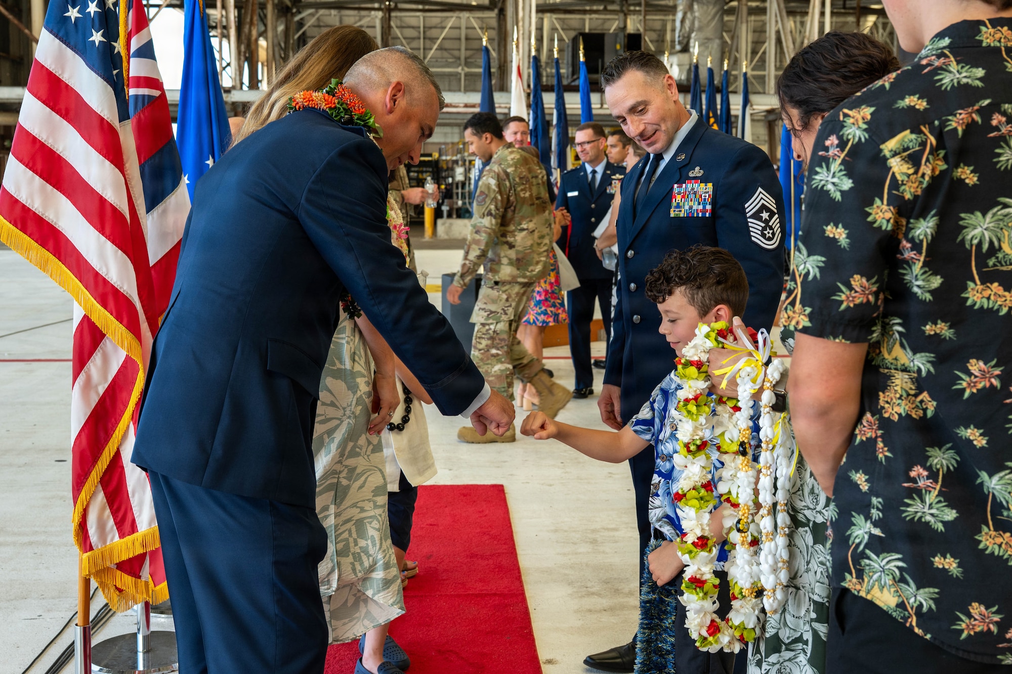 U.S. Air Force Col. Kyle Clinton, incoming 15th Wing commander, greets well-wishers at the reception line during the wing change of command ceremony at Joint Base Pearl Harbor-Hickam, Hawaii, June 18, 2026. The ceremony marked the formal transfer of leadership and responsibility for the 15th Wing. (U.S. Air Force photo by Senior Airman Lauren Torres)