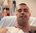 Air Force Senior Master Sgt. Christopher Fisher the day after his maxillofacial restoration surgery at Brooke Army Medical Center, Joint Base San Antonio-Fort Sam Houston, Texas, Feb. 25, 2026. Fisher developed a tumor in his lower jaw that began to shift his teeth. (Courtesy Photo)