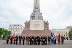 A multinational group of NATO military leaders assemble near the Freedom Monument in honor of Occupation of the Latvian Republic Day in Riga, Latvia, June 17, 2026. BALTOPS 2026, the premiere maritime-focused exercise in the Baltic Sea region, provides a unique training opportunity to strengthen combined response capabilities critical to preserving freedom of navigation and security in the Baltic Sea.  (U.S. Navy Courtesy Asset)