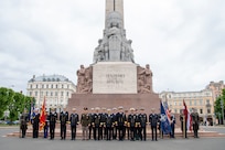 A multinational group of NATO military leaders assemble near the Freedom Monument in honor of Occupation of the Latvian Republic Day in Riga, Latvia, June 17, 2026.