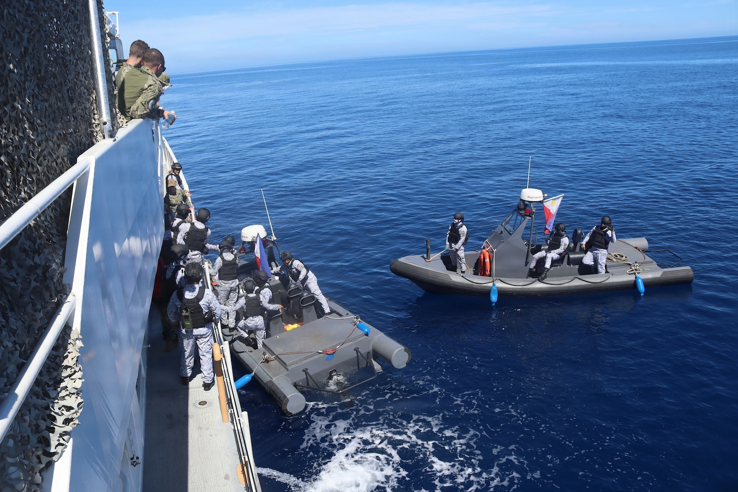 Members of the Armed Forces of the Philippines board U.S. Coast Guard Sentinel-class fast response cutter Charles Moulthrope (WPC 1141) during a Maritime Cooperative Activity. U.S. 7th Fleet routinely operates with the Armed Forces of the Philippines and partners and allies through MCAs to continually develop, exercise and enhance multi-domain tactical interoperability to uphold peace and security in the region. (Courtesy photo by U.S. Coast Guard)