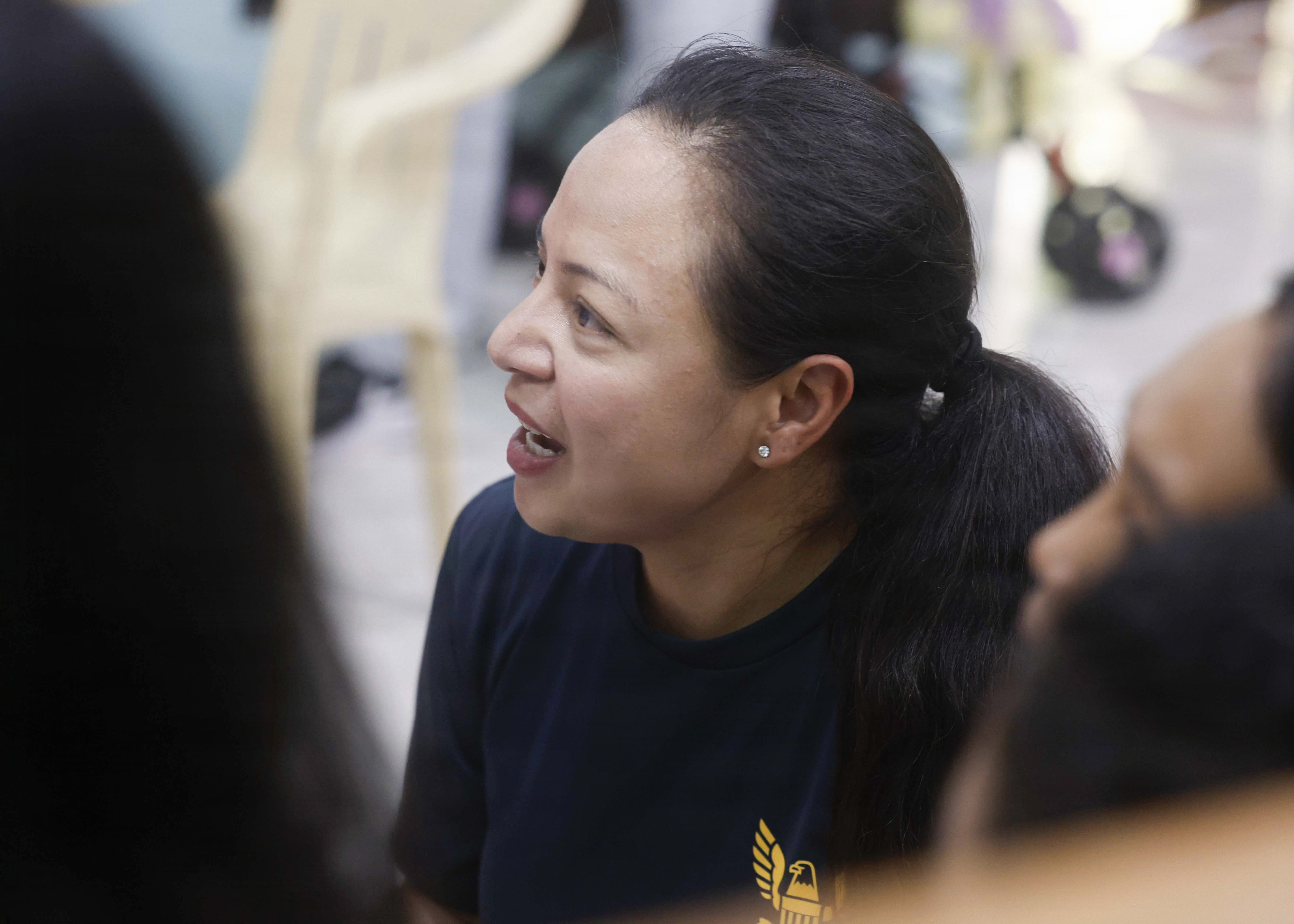 OLONGAPO CITY, Philippines (June 12, 2026) – U.S. Navy Chief Logistics Specialist Rhona Dumlao, assigned to Pacific Partnership 2026 (PP26), sings with children during a PP26 community outreach and engagement event at the Olongapo Social Development Center in Olongapo City, Philippines, June 12, 2026.