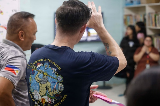 OLONGAPO CITY, Philippines (June 12, 2026) – U.S. Navy Chief Musician James Choate, assigned to Pacific Partnership 2026 (PP26), speaks with children during a PP26 community outreach and engagement event at the Olongapo Social Development Center in Olongapo City, Philippines, June 12, 2026.