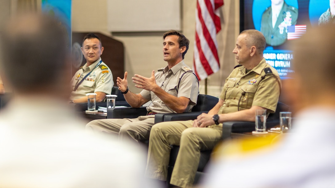 British Royal Marine Corps Brigadier Jamie M. Norman, center, the commander of the United Kingdom Commando Force, speaks during the Integrating and Countering Autonomous Systems in the All-Domain Fight Panel at the Pacific Amphibious Leaders Symposium 2026, Honolulu, Hawaii, June 17, 2026. Bringing together experts and leaders from across the Indo-Pacific, PALS fosters collaboration among allied and partner amphibious and maritime forces to share knowledge and recent operational insights. This year was the 12th iteration of the symposium and hosted senior leaders from 25 participating nations who are committed to a free and open Indo-Pacific, with the objective of strengthening and developing regional relationships. (U.S. Marine Corps photo by Lance Cpl. Blake Gonter)