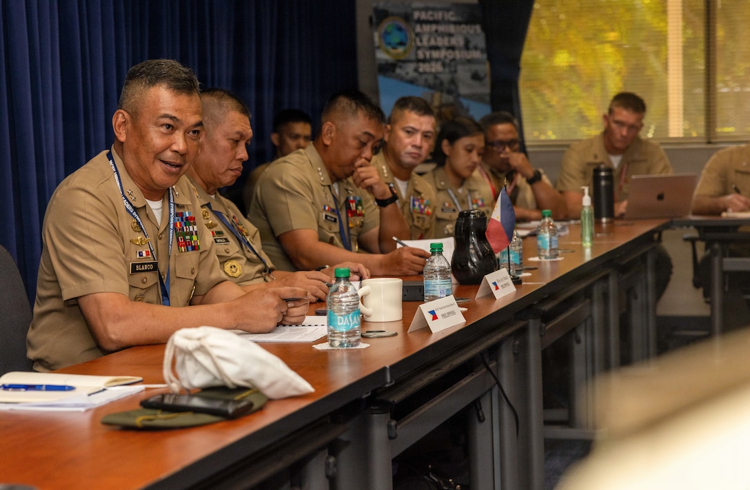 Commandant of the Philippine Marine Corps Maj. Gen. Vicente M.A.P. Blanco III, left, speaks during a multilateral key leader engagement at the Pacific Amphibious Leaders Symposium 2026 in Honolulu, Hawaii, June 16, 2026. Bringing together experts and leaders from across the Indo-Pacific, PALS fosters collaboration among allied and partner amphibious and maritime forces to share knowledge and recent operational insights. This year was the 12th iteration of the symposium and hosted senior leaders from 25 participating nations who are committed to a free and open Indo-Pacific, with the objective of strengthening and developing regional relationships. (U.S. Marine Corps photo by Staff Sgt. Marcos A. Alvarado)