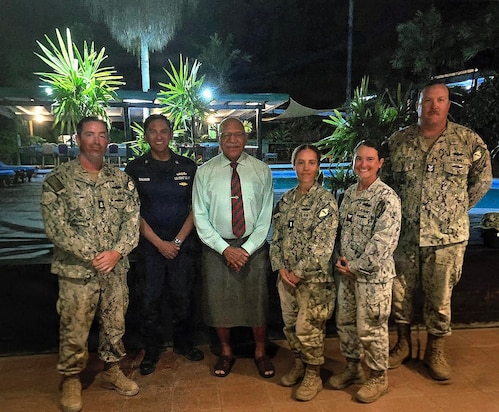 SAVUSAVU, Fiji (June 3, 2026) – The Hon. Sitiveni Rabuka, Prime Minister of Fiji, center, poses for a photo with a U.S. Coast Guardsman and Sailors, assigned to Naval Mobile Construction Battalion (NMCB) 1, during a visit to discuss their two-room schoolhouse construction project at Nabua Village in SavuSavu, Fiji, June 3, 2026.