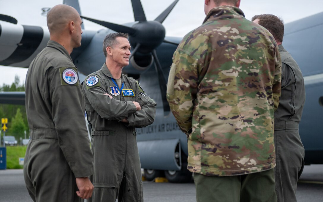 U.S. Air Force Brig. Gen. Matt French, center left, Air National Guard assistant to the commander, U.S. Air Forces in Europe-Air Forces Africa, speaks with Airmen assigned to the 123rd Airlift Wing, Kentucky Air National Guard, during a distinguished visitor event as part of exercise Ramstein Flag at Lapland Air Wing in Rovaniemi, Finland, June 16, 2026. The 123rd AW is providing tactical airlift support to NATO Allies throughout the month of June in support of Ramstein Flag 2026, an Allied Air Command large-scale, multi-location and joint operating area exercise with 18 participating nations and more than 200 aircraft. (U.S. Air National Guard photo by Senior Airman Annaliese Billings)