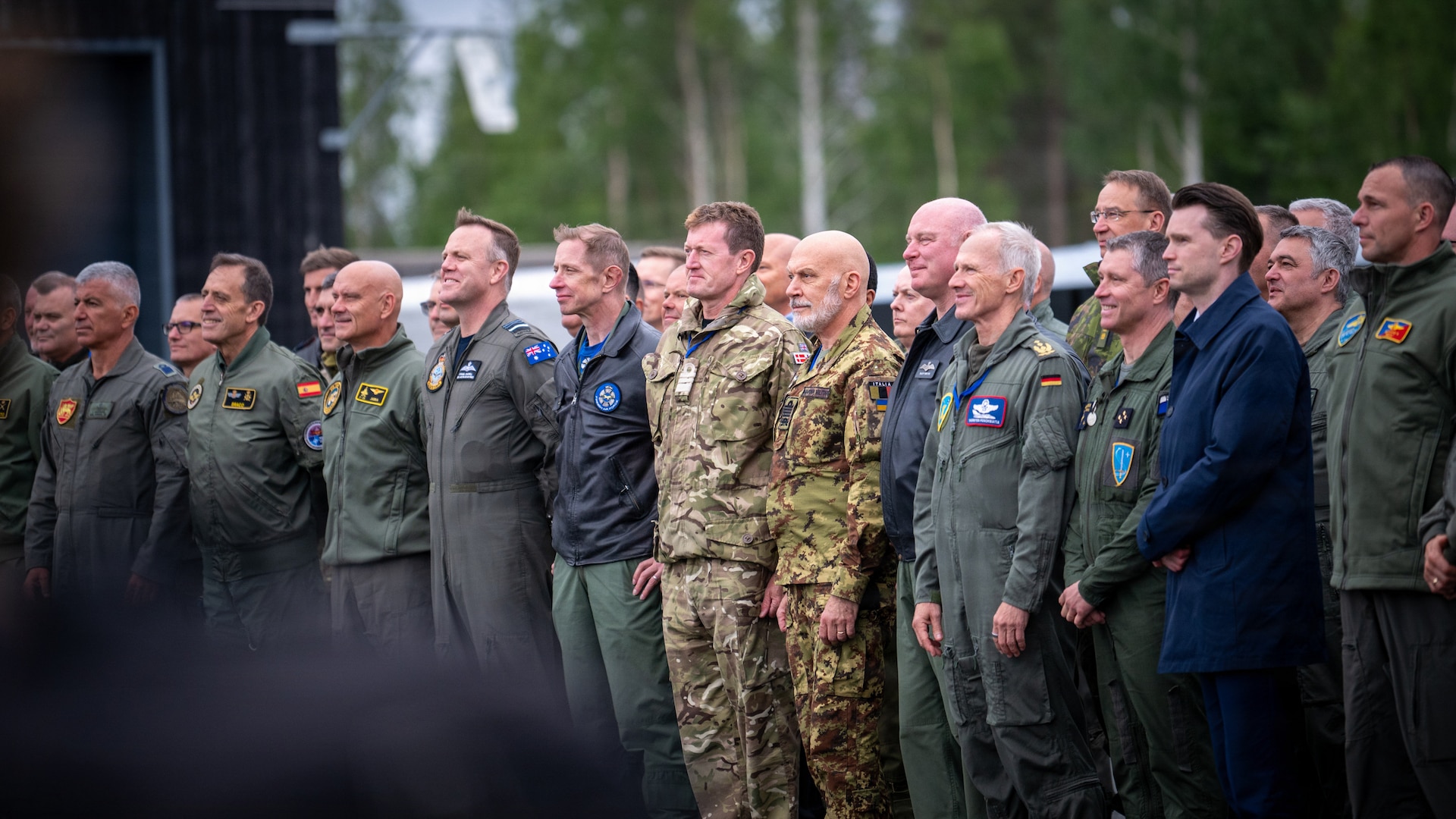 Distinguished visitors from NATO Allied nations pose for a group photograph during a visit at Lapland Air Wing in Rovaniemi, Finland, as part of exercise Ramstein Flag, June 16, 2026. Ramstein Flag 2026 is a complex, large-scale, tactical-level exercise which demonstrates NATO’s determination to counter modern and emerging threats through distributed operations. (U.S. Air National Guard photo by Senior Airman Annaliese Billings)