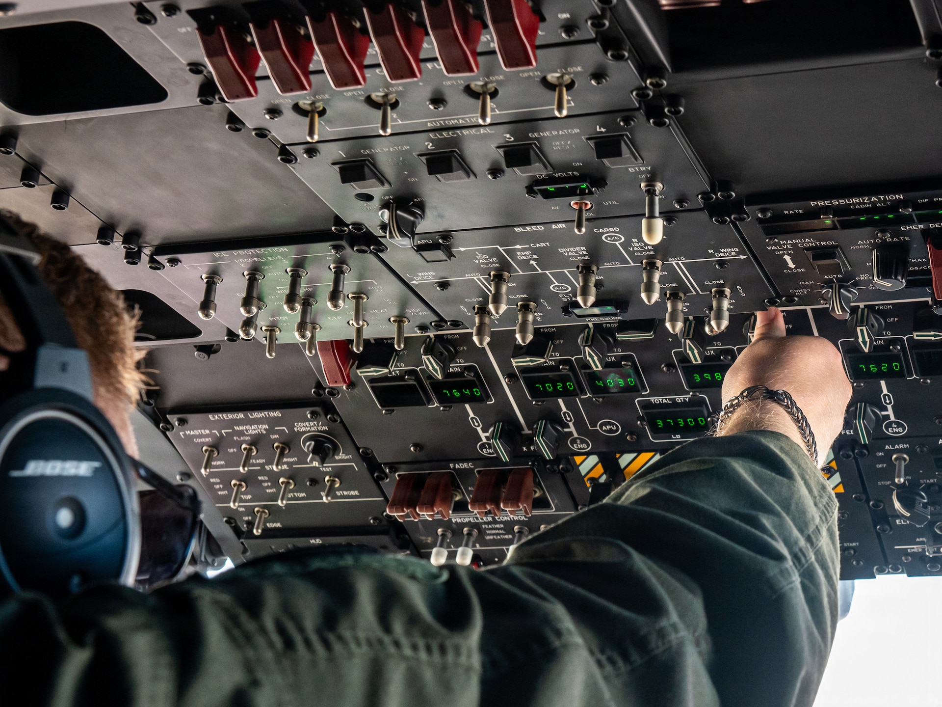 U.S. Air Force Senior Airman Andrew Hudson, a loadmaster assigned to the 123rd Airlift Wing, Kentucky Air National Guard, adjusts the controls on the flight deck of a C-130J Super Hercules aircraft during an airlift mission as part of exercise Ramstein Flag to Melsbroek Air Base in Brussels, Belgium, June 15, 2026. The 123rd AW is providing tactical airlift support to NATO Allies throughout the month of June in support of Ramstein Flag 2026, an Allied Air Command large-scale, multi-location and joint operating area exercise with 18 participating nations and more than 200 aircraft. (U.S. Air National Guard photo by Senior Airman Annaliese Billings)