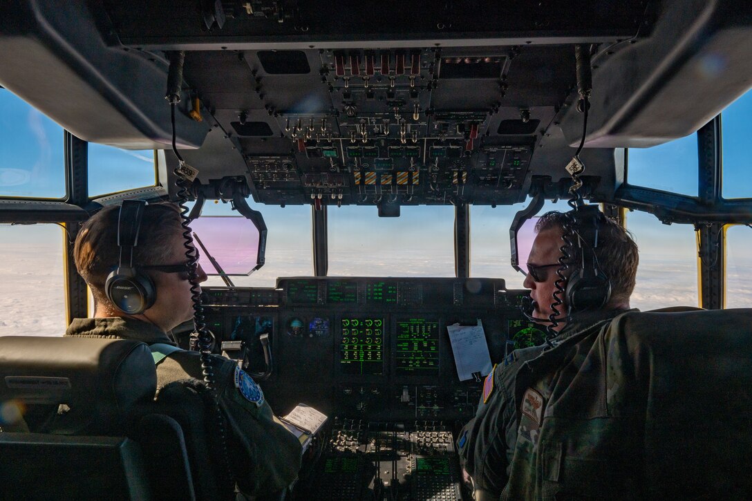 U.S. Air Force Lt. Col. Loren Miller, left, and Capt. Kyle Wood, both pilots assigned to the 123rd Airlift Wing, Kentucky Air National Guard, fly a C-130J Super Hercules aircraft during an airlift mission for exercise Ramstein Flag to Melsbroek Air Base in Brussels, Belgium, June 15, 2026. The 123rd AW is providing tactical airlift support to NATO Allies throughout the month of June in support of Ramstein Flag 2026, an Allied Air Command large-scale, multi-location and joint operating area exercise with 18 participating nations and more than 200 aircraft. (U.S. Air National Guard photo by Senior Airman Annaliese Billings)
