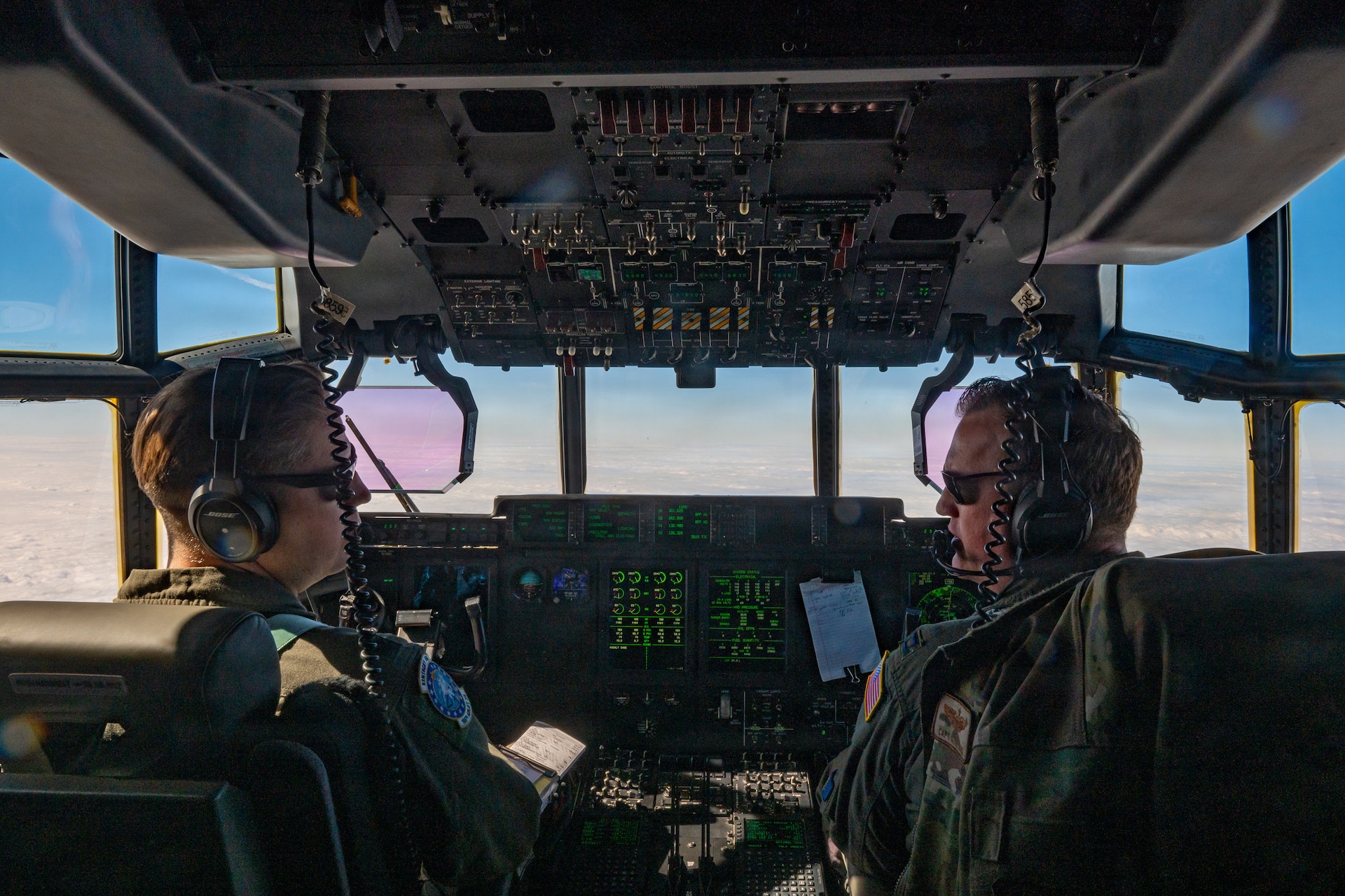 U.S. Air Force Lt. Col. Loren Miller, left, and Capt. Kyle Wood, both pilots assigned to the 123rd Airlift Wing, Kentucky Air National Guard, fly a C-130J Super Hercules aircraft during an airlift mission for exercise Ramstein Flag to Melsbroek Air Base in Brussels, Belgium, June 15, 2026. The 123rd AW is providing tactical airlift support to NATO Allies throughout the month of June in support of Ramstein Flag 2026, an Allied Air Command large-scale, multi-location and joint operating area exercise with 18 participating nations and more than 200 aircraft. (U.S. Air National Guard photo by Senior Airman Annaliese Billings)