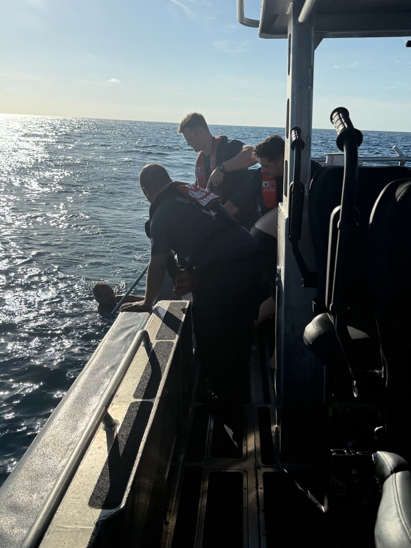 A U.S. Coast Guard Station Miami Beach boat crew rescued two men, four miles east of Elliot Key, after both individuals reportedly drifted away from their vessel near Ceasar Creek, June 21, 2026. No injuries were reported. (U.S. Coast Guard photo courtesy of Station Miami Beach rescue crew)