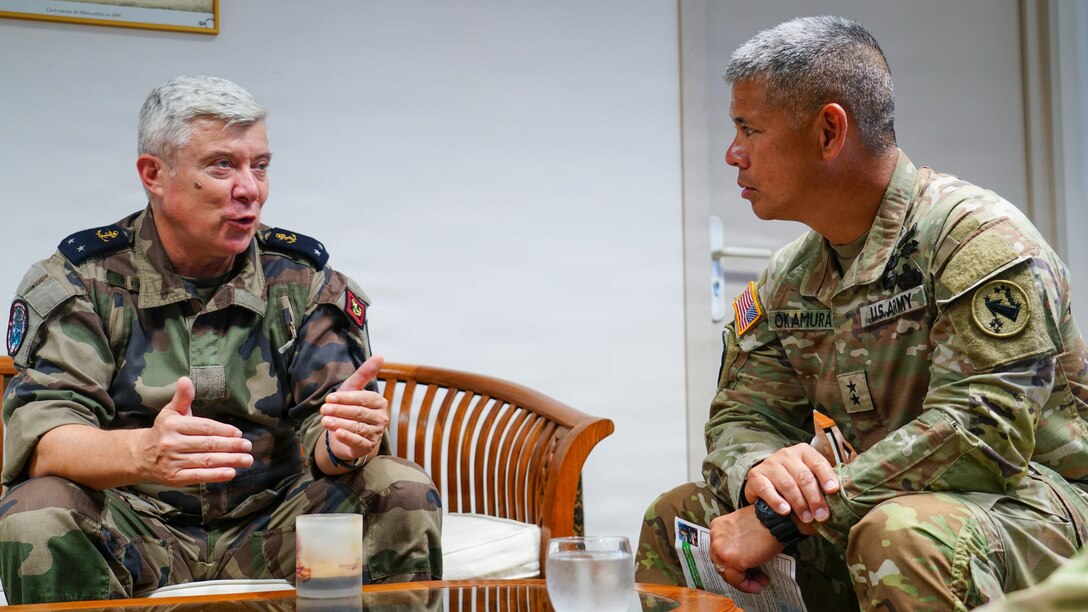 Rear Adm. Guillaume Pinget, commander of the French Armed Forces in French Polynesia, speaks with Maj. Gen. Lance Okamura, deputy commanding general of U.S. Army Pacific–Homeland Affairs, during an office call following a distinguished visitor day for Exercise MARARA 26 in Tahiti, French Polynesia, June 16, 2026.