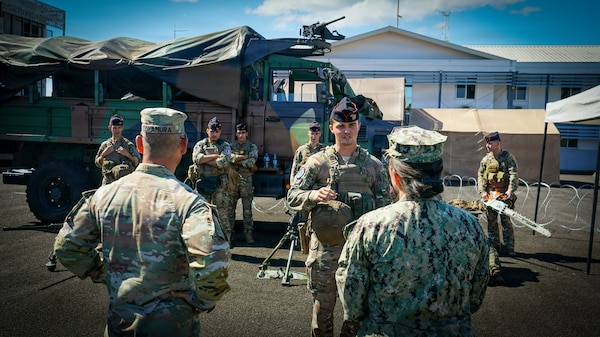 Maj. Gen. Lance Okamura, deputy commanding general of U.S. Army Pacific–Homeland Affairs, and Rear Adm. Suzanne Bailey, deputy commander of U.S. Third Fleet, receive a capability brief from a French Armed Forces in French Polynesia service member during a distinguished visitor day for Exercise MARARA 26 in Tahiti, French Polynesia, June 16, 2026.