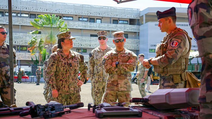 Rear Adm. Suzanne Bailey, deputy commander of U.S. Third Fleet, and Maj. Gen. Lance Okamura, deputy commanding general of U.S. Army Pacific–Homeland Affairs, observe equipment and technology displayed by the French Armed Forces in French Polynesia during Exercise MARARA 26 in Tahiti, French Polynesia, June 16, 2026