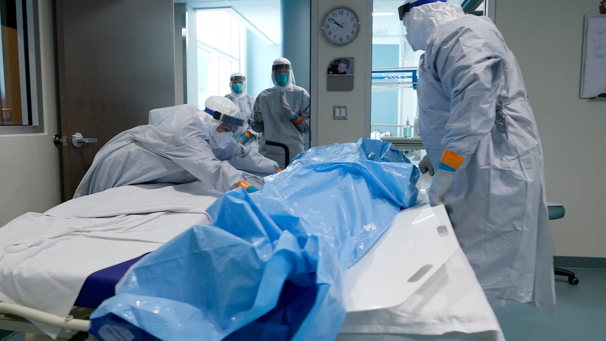 Medical personnel at the Center for Sustainment of Trauma and Readiness Skills (C-STARS) Omaha secure personal protective equipment before infectious control training at the University of Nebraska Medical Center, June 14, 2024.