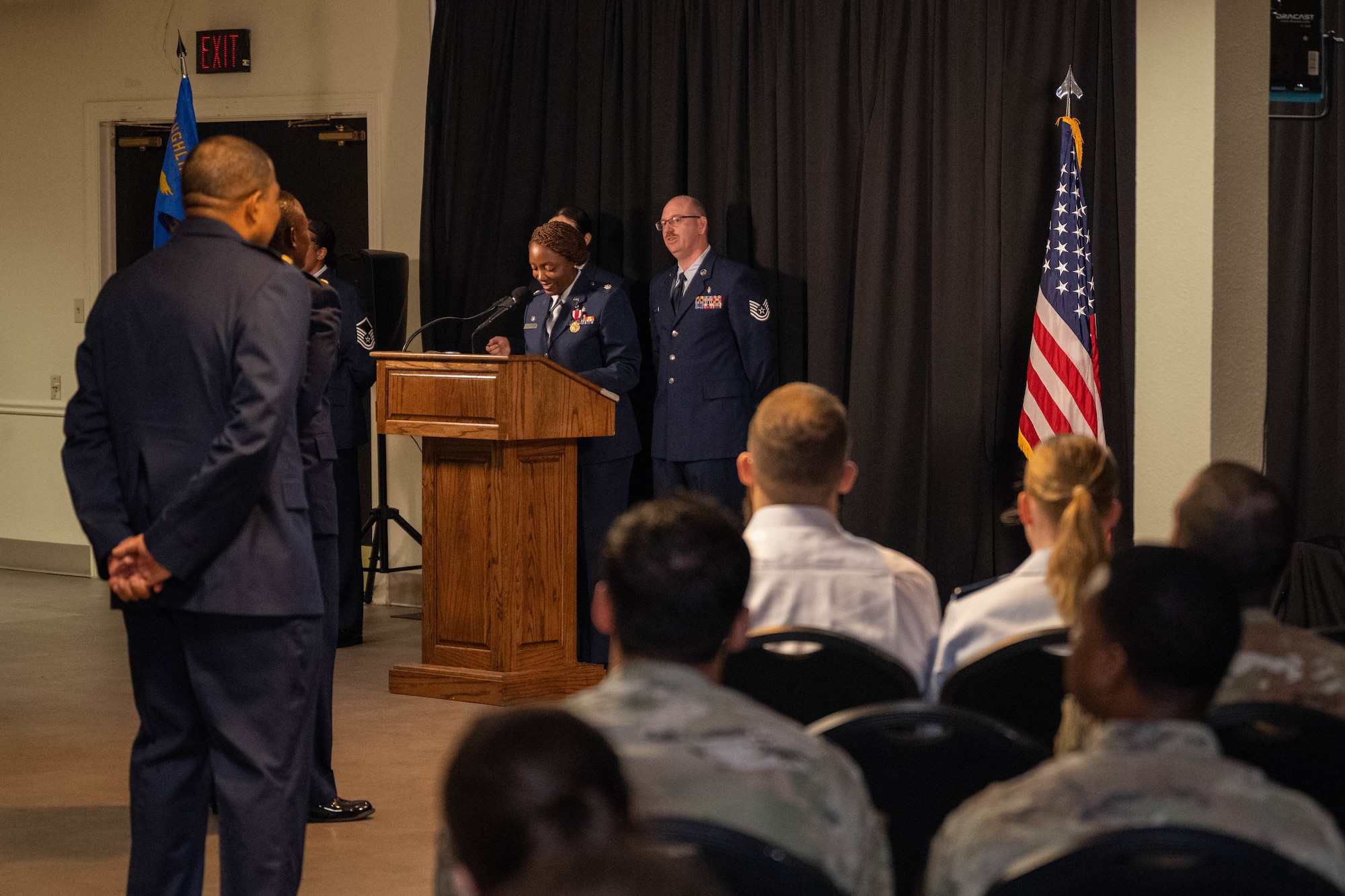 U.S. Air Force Lt. Col. Avis McCaslin, outgoing Laughlin Operational Medical Readiness Squadron (LOMRS) commander, delivers remarks during the LOMRS change of command ceremony at Laughlin Air Force Base, Texas, June 18, 2026. McCaslin thanked her squadron for the opportunity to lead and for their efforts during her tenure. (U.S. Air Force photo by Airman 1st Class Darryl Keith)