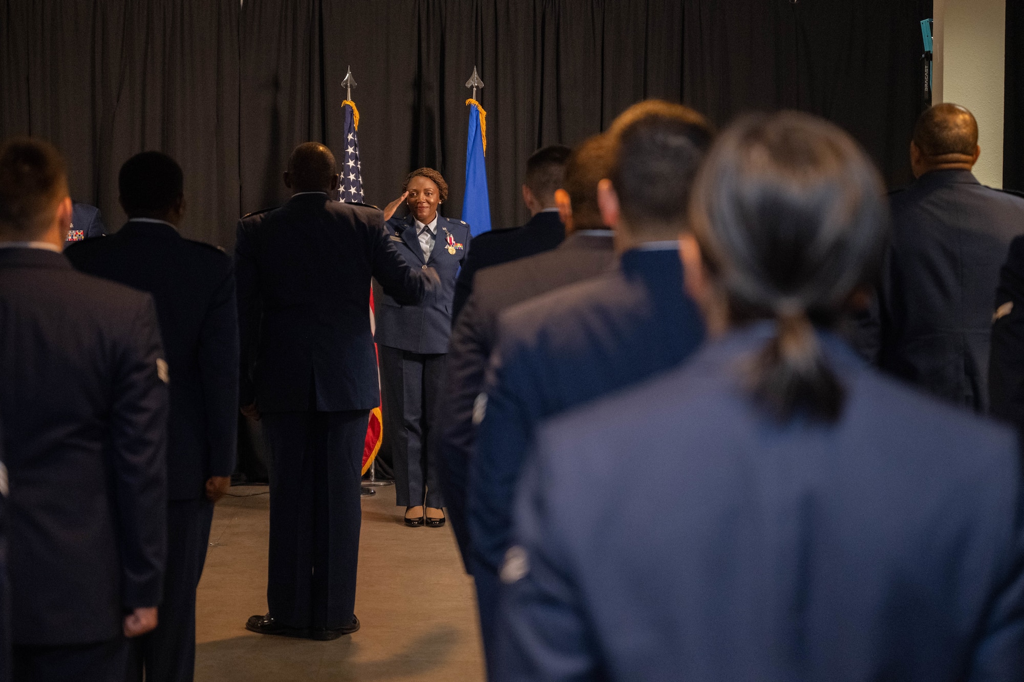 U.S. Air Force Lt. Col. Avis McCaslin, outgoing Laughlin Operational Medical Readiness Squadron (LOMRS) commander, renders a final salute to their squadron during the LOMRS change of command ceremony at Laughlin Air Force Base, Texas, June 18, 2026. As commander, McCaslin oversaw over 24,500 patient visits, drove Laughlin’s dental readiness to the number one rate in Air Education and Training Command and established the base’s first victim advocate program. (U.S. Air Force photo by Airman 1st Class Darryl Keith)