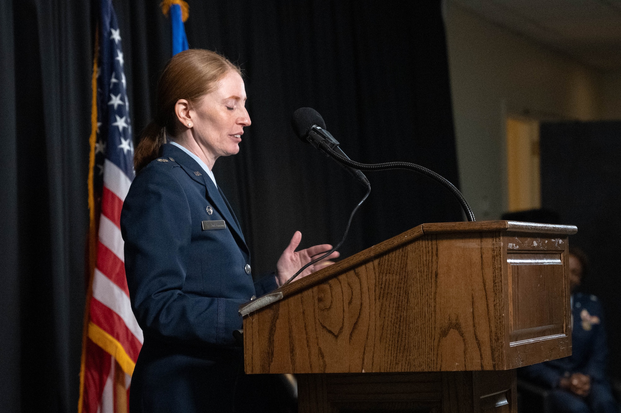 U.S. Air Force Lt. Col. Katrina Dyke, Laughlin Operational Medical Readiness Squadron (LOMRS) commander, delivers remarks during the LORMS change of command ceremony at Laughlin Air Force Base, Texas, June 18, 2026. Dyke formally introduced herself and expressed their expectations of the squadron. (U.S. Air Force photo by Airman 1st Class Darryl Keith)