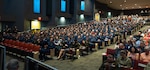 The 261 residents and fellows from 58 diverse physician and allied health specialty programs wait to take the stage during the San Antonio Uniformed Services Health Education Consortium graduation ceremony at the Lila Cockrell Theatre in downtown San Antonio, June 11, 2026. SAUSHEC is the organization responsible for military graduate medical education and graduate allied health education in San Antonio with two major training sites at Brooke Army Medical Center and the 59th Medical Wing. (DoW Photo by James Camillocci)