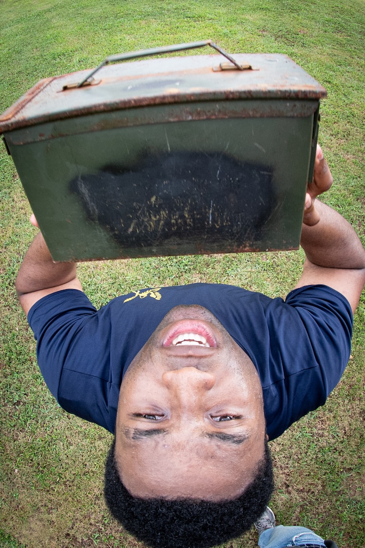 Navy Hospitalman Dadran Miles performs ammo can lifts during the Navy Medicine Readiness and Training Command Cherry Point’s annual “Corpsman Cup” on Thursday, June 18, 2026.  The competition celebrated the 128th birthday of the Navy Hospital Corps and included events stressing the physical and mental grit of the Sailors while evaluating their skills.