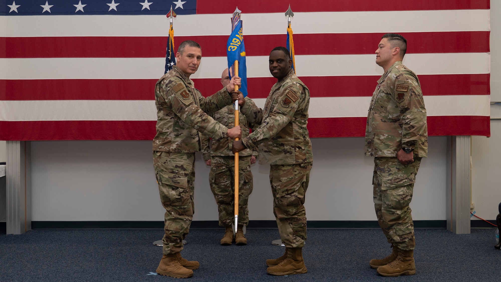 Incoming commander receives squadron guidon