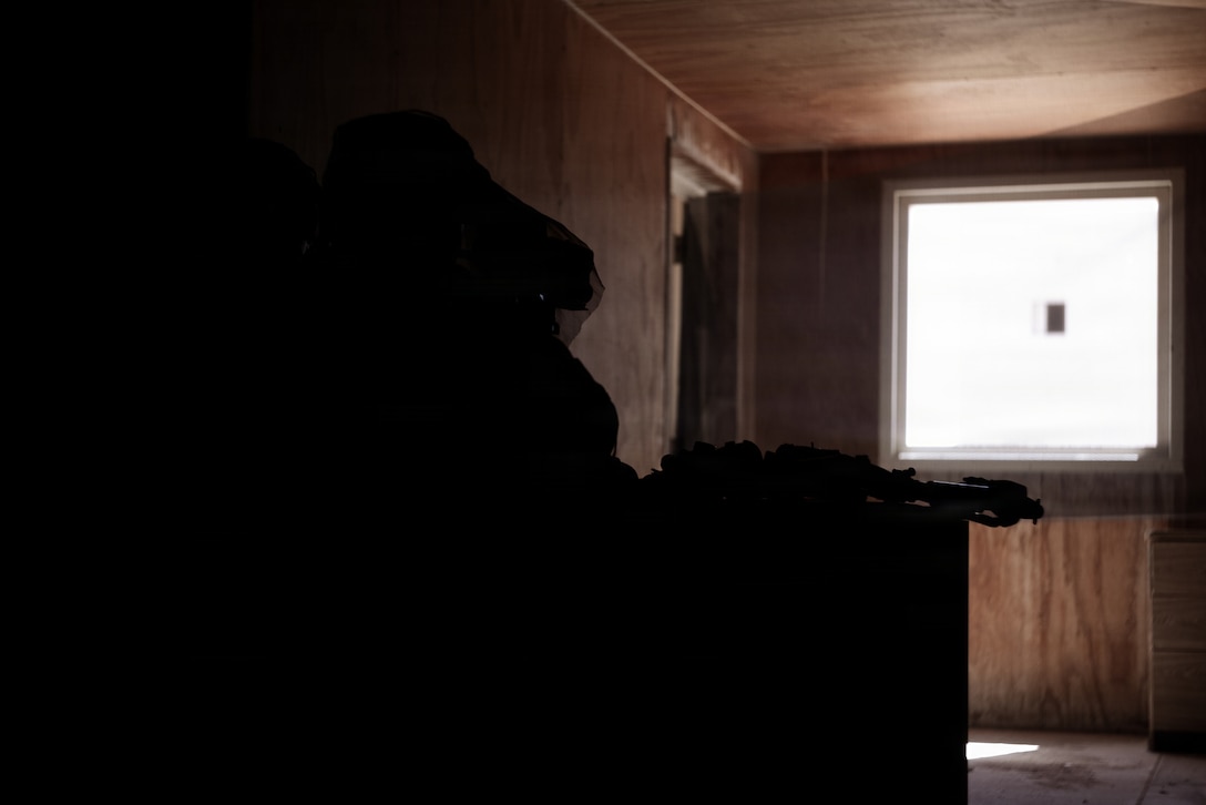U.S. Marine Corps scouts with 2nd Battalion, 24th Marines, 4th Marine Division, observe simulated enemy movements from a listening and observing post as part of an information and intelligence integration course during Integrated Training Exercise 3-26, Marine Corps Air Ground Combat Center Twentynine Palms, California, June 8, 2026. ITX is designed to generate combat readiness and ensure the Reserve Component provides critical strategic depth to the Total Force. From complex combined arms maneuvers to all-domain integration, these Marines are proving that they are ready to augment, reinforce, and fight alongside the active component at a moment's notice. (U.S. Marine Corps photo by Cpl. Van Hoang)
