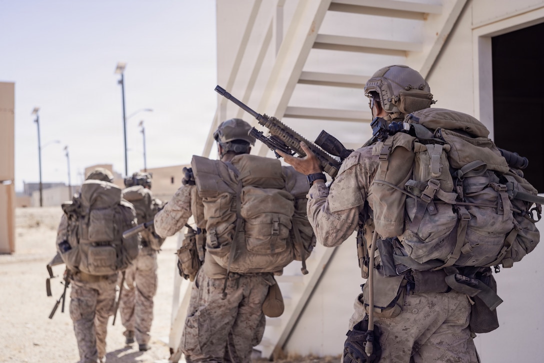 U.S. Marine Corps scouts with 2nd Battalion, 24th Marines, 4th Marine Division, displace from a listening and observing post after completing objectives as part of an information and intelligence integration course during Integrated Training Exercise 3-26, Marine Corps Air Ground Combat Center Twentynine Palms, California, June 8, 2026. ITX is designed to generate combat readiness and ensure the Reserve Component provides critical strategic depth to the Total Force. From complex combined arms maneuvers to all-domain integration, these Marines are proving that they are ready to augment, reinforce, and fight alongside the active component at a moment's notice. (U.S. Marine Corps photo by Cpl. Van Hoang)