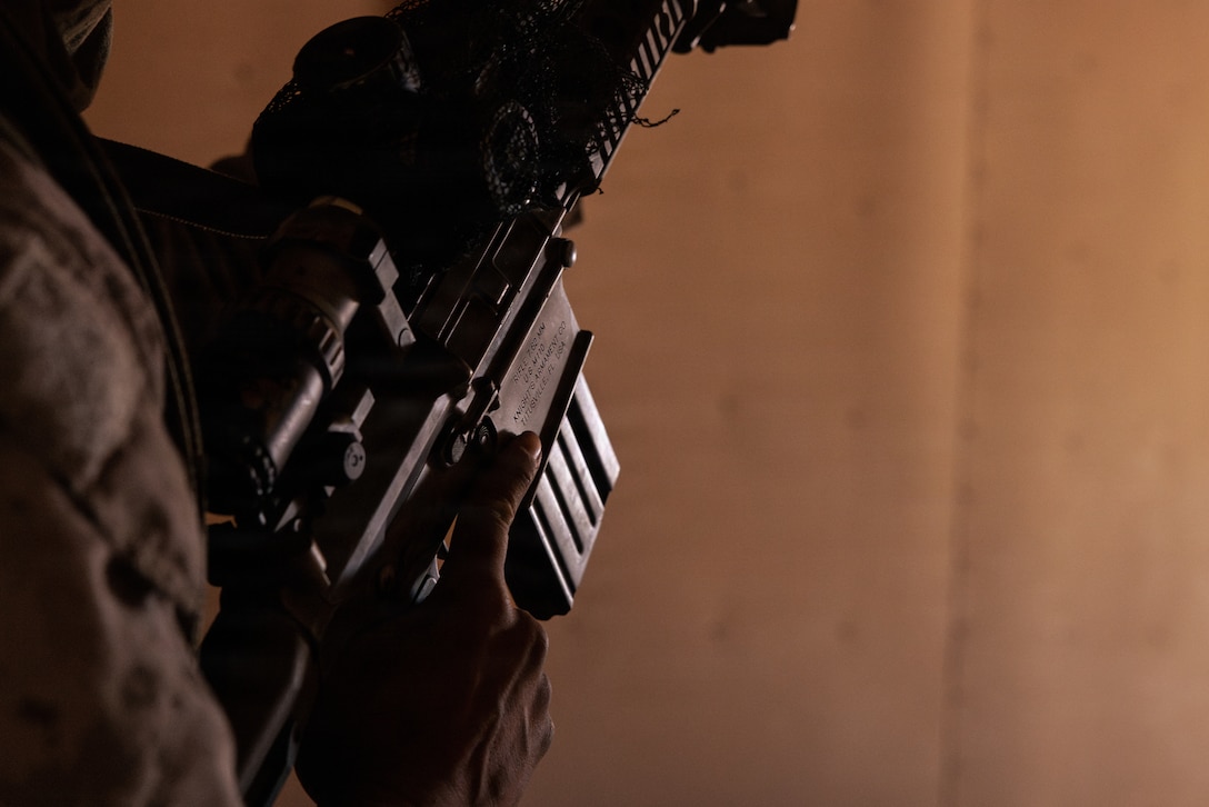 A U.S. Marine Corps scout with 2nd Battalion, 24th Marines, 4th Marine Division, provides security for a listening and observing post as part of an information and intelligence integration course during Integrated Training Exercise 3-26, Marine Corps Air Ground Combat Center Twentynine Palms, California, June 8, 2026. ITX is designed to generate combat readiness and ensure the Reserve Component provides critical strategic depth to the Total Force. From complex combined arms maneuvers to all-domain integration, these Marines are proving that they are ready to augment, reinforce, and fight alongside the active component at a moment's notice. (U.S. Marine Corps photo by Cpl. Van Hoang)