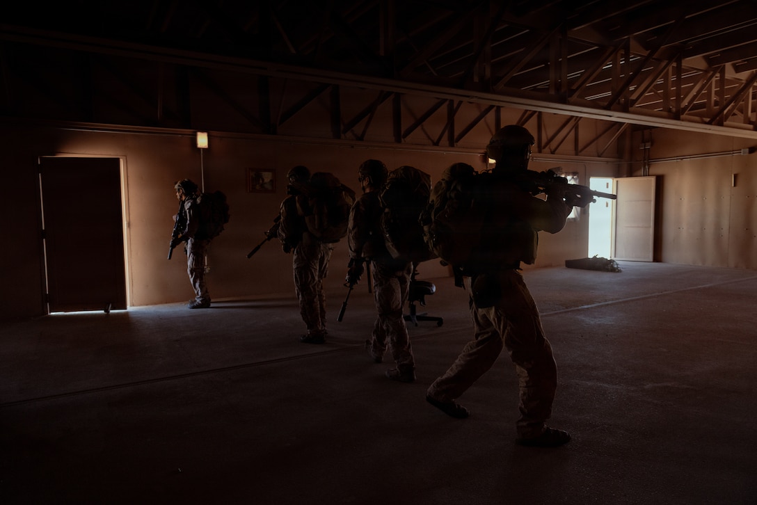 U.S. Marine Corps scouts with 2nd Battalion, 24th Marines, 4th Marine Division, relocate from a listening and observing post as part of an information and intelligence integration course during Integrated Training Exercise 3-26, Marine Corps Air Ground Combat Center Twentynine Palms, California, June 8, 2026. ITX is designed to generate combat readiness and ensure the Reserve Component provides critical strategic depth to the Total Force. From complex combined arms maneuvers to all-domain integration, these Marines are proving that they are ready to augment, reinforce, and fight alongside the active component at a moment's notice. (U.S. Marine Corps photo by Cpl. Van Hoang)