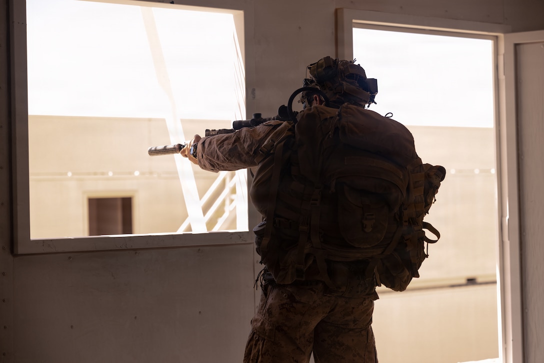 A U.S. Marine Corps scout with 2nd Battalion, 24th Marines, 4th Marine Division, provides security as part of an information and intelligence integration course during Integrated Training Exercise 3-26, Marine Corps Air Ground Combat Center Twentynine Palms, California, June 8, 2026. ITX is designed to generate combat readiness and ensure the Reserve Component provides critical strategic depth to the Total Force. From complex combined arms maneuvers to all-domain integration, these Marines are proving that they are ready to augment, reinforce, and fight alongside the active component at a moment's notice. (U.S. Marine Corps photo by Cpl. Van Hoang)