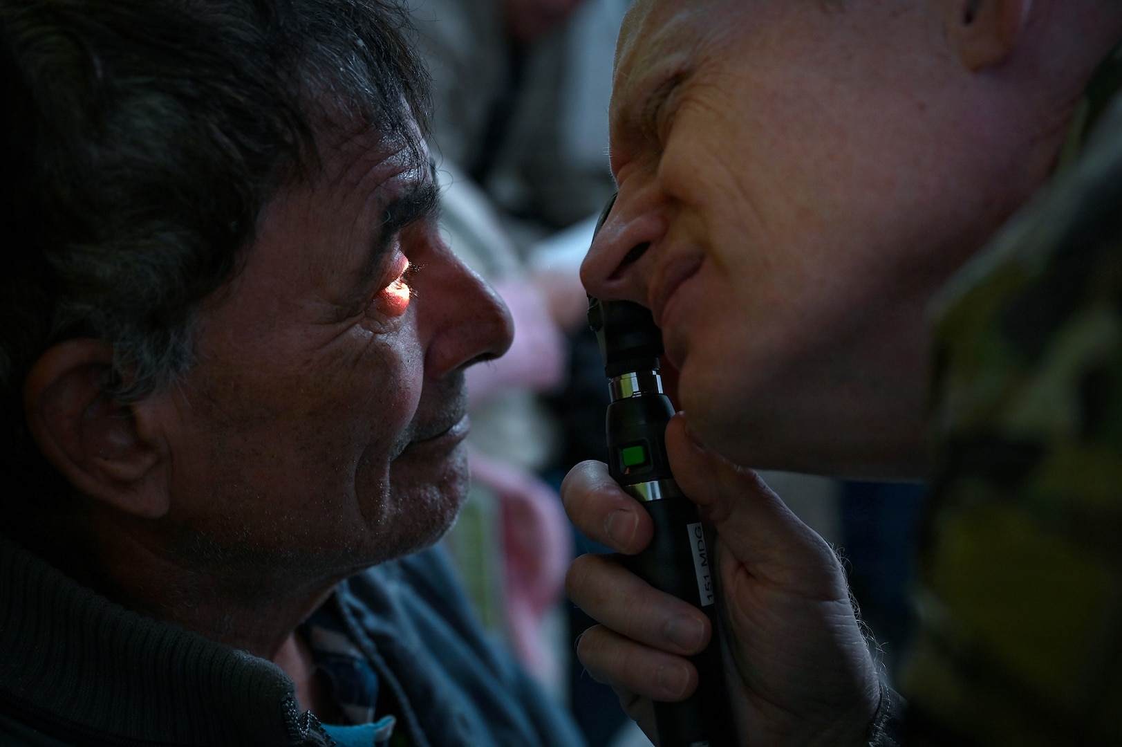 U.S. Air Force Lt. Col. Kirk Drennan, an optometrist with the Utah Air National Guard’s 151st Medical Group, performs an eye exam at Unidad de Salud Familiar Niño de Jesús in Asuncion, Paraguay June 18, 2026, as part of exercise Amistad 2026.