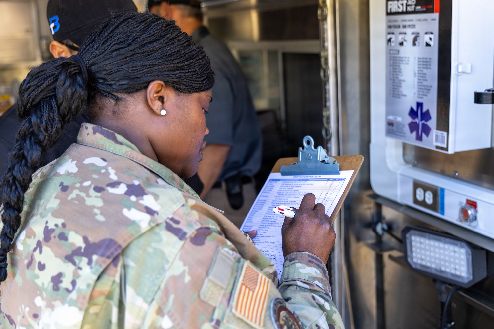 U.S. Air Force Tech. Sgt. Brittany Meadows, 145th Force Support Squadron services geographically separated unit NCO in charge, annotates the completed inspection of a first aid kit during a three-day training course at the Charlotte Air National Guard Base, Charlotte, N.C., April 21-23, 2026.