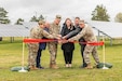 A scene from the ribbon-cutting ceremony celebrating the official opening of the installation’s new $1.4 million Main Gate Microgrid with Battery Backup Project is shown May 19, 2026, at Fort McCoy, Wis. Fort McCoy Directorate of Public Works Director Liane Haun served as narrator and emcee for the ceremony. Fort McCoy Chaplain (Maj.) Walter McCall delivered the invocation. Fort McCoy Senior Commander Maj. Gen. Joseph Ricciardi, commanding general of the 88th Readiness Division, and Fort McCoy Garrison Commander Col. Sheyla Baez Ramirez also spoke at the ceremony. (U.S. Army Photo by Amanda Clark/Fort McCoy Multimedia-Visual Information Office)