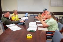 Photo of auditor with TYAD employees.