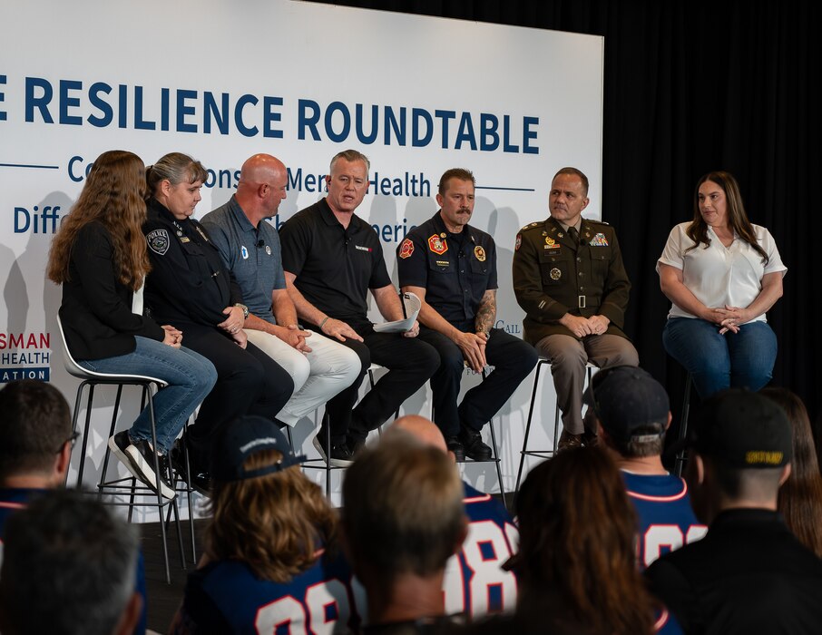 Panelists participate in a discussion during "In the Open: Strength Beyond the Uniform" at The Ballpark at America First Square, June 13, 2025. The roundtable focused on shared experiences with stress, trauma and resilience among military members, first responders and former professional athletes. (Utah National Guard photo by Master Sgt. Nicholas Perez)