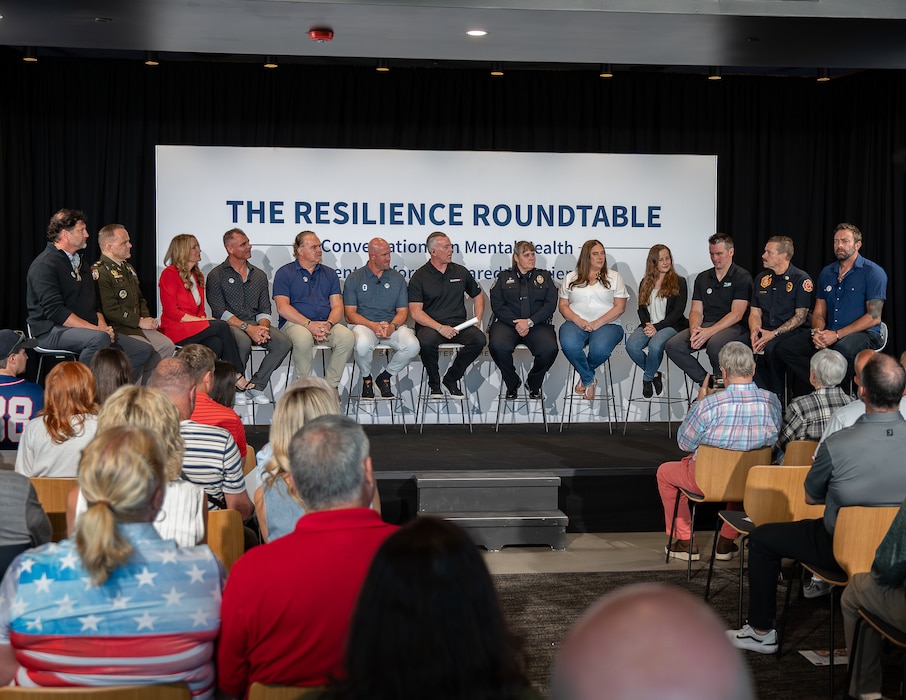 Panelists participate in a discussion during "In the Open: Strength Beyond the Uniform" at The Ballpark at America First Square, June 13, 2025. The roundtable focused on shared experiences with stress, trauma and resilience among military members, first responders and former professional athletes. (Utah National Guard photo by Master Sgt. Nicholas Perez)
