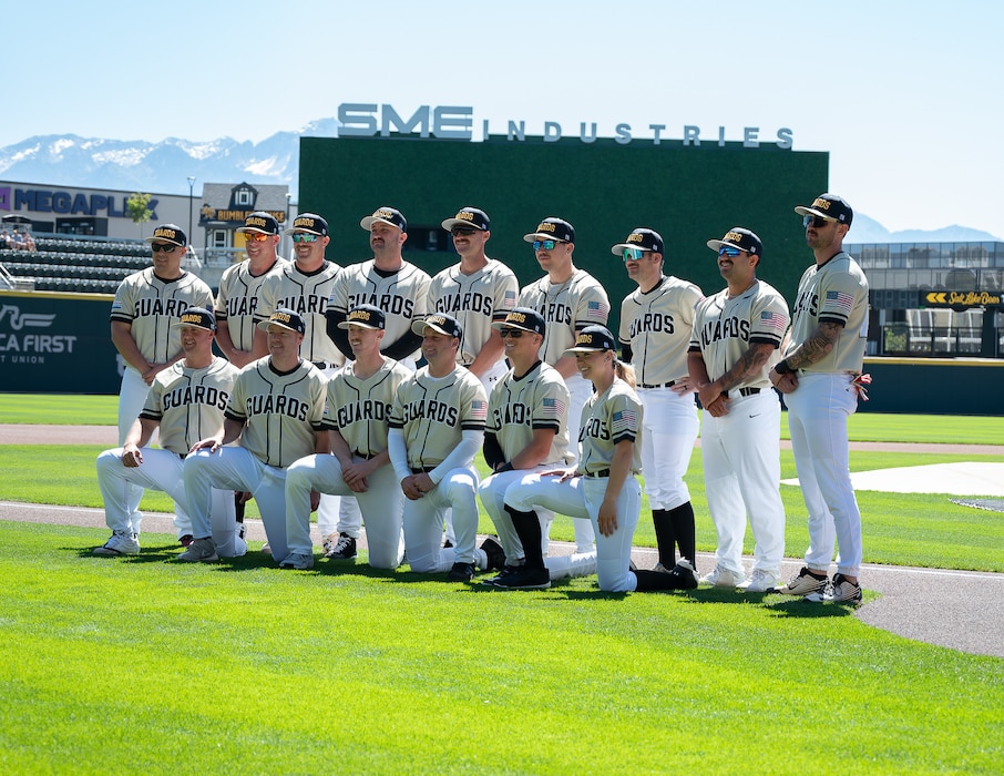 Members of the Utah National Guard baseball team pose for a group photo before an exhibition game against Hill Air Force Base at The Ballpark at America First Square in South Jordan, Utah, June 13, 2025. The game followed a community resilience event focused on mental health awareness and support. (Utah National Guard photo by Master Sgt. Nicholas Perez)