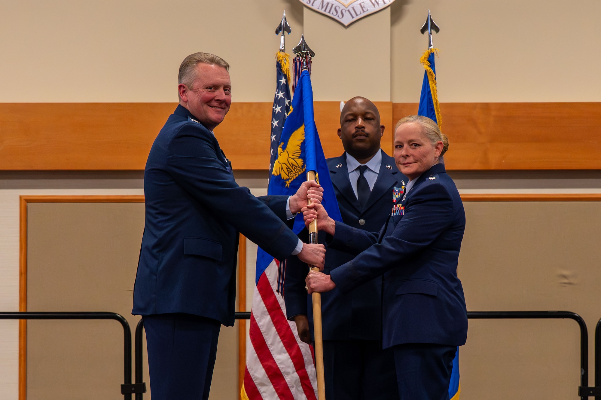 U.S. Air Force Lt. Col. Melissa Anhalt, right, accepts command of the 341st Operational Medical Readiness Squadron from Col. Jason Tompkins, 341st Medical Group commander, during a change of command ceremony at Malmstrom Air Force Base, Montana, June 17, 2026.