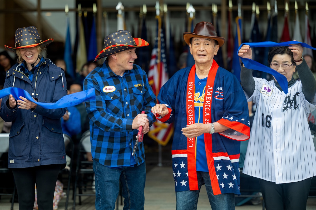 U.S. Air Force Col. Paul Davidson, 35th Fighter Wing commander, and Mayor Yoshinori Kohiyama of Misawa City cut a ribbon during an American Day opening ceremony.