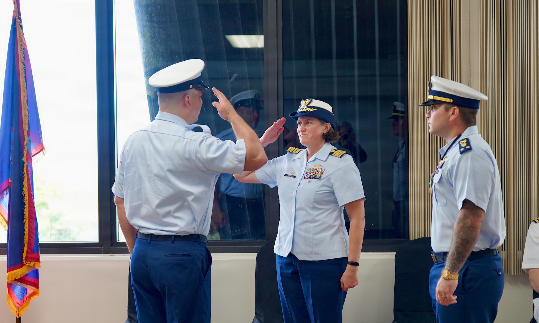 Senior Chief Petty Officer Calvin Hernandez assumes command of U.S. Coast Guard Station Apra Harbor from Chief Warrant Officer Kyle Breen-Tapia in a change of command ceremony at Top o’the Mar in Guam on June 23, 2026. Capt. Jessica Worst, commander of U.S. Coast Guard Forces Micronesia/Sector Guam, presided over the ceremony. During Breen-Tapia's tenure as officer-in-charge from June 2025 to June 2026, he led 51 active-duty and reserve personnel through more than 500 resource sorties and 2,500 underway hours across the remote waters of Micronesia, saving or assisting 106 lives. (U.S. Coast Guard photo by Lt. Sara Muir)