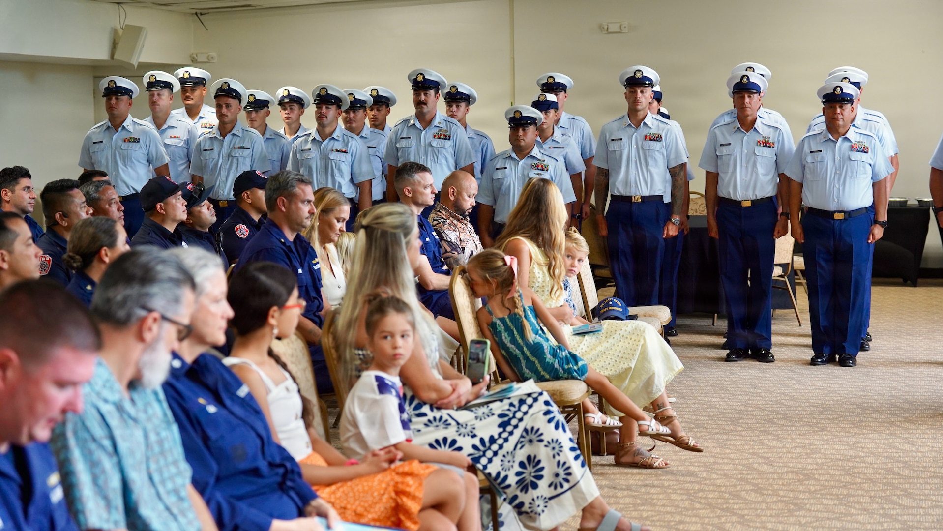 Senior Chief Petty Officer Calvin Hernandez assumes command of U.S. Coast Guard Station Apra Harbor from Chief Warrant Officer Kyle Breen-Tapia in a change of command ceremony at Top o’the Mar in Guam on June 23, 2026. Capt. Jessica Worst, commander of U.S. Coast Guard Forces Micronesia/Sector Guam, presided over the ceremony. During Breen-Tapia's tenure as officer-in-charge from June 2025 to June 2026, he led 51 active-duty and reserve personnel through more than 500 resource sorties and 2,500 underway hours across the remote waters of Micronesia, saving or assisting 106 lives. (U.S. Coast Guard photo by Lt. Sara Muir)