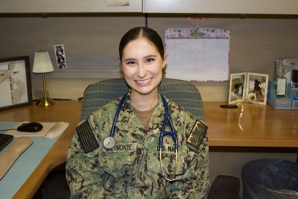 Hospitalman Chloe Gerimonte poses for a photo inside the Adult Medical Care Clinic at Navy Medicine Readiness and Training Command Twentynine Palms aboard Marine Corps Air Ground Combat Center Twentynine Palms, California, April 1, 2026. Gerimonte previously worked at the clinic as a civilian contractor before answering the call to serve and joining the Navy Hospital Corps. (U.S. Navy photo by Hospital Apprentice Evelyn Zermeno, NH/NMRTC Twentynine Palms public affairs).