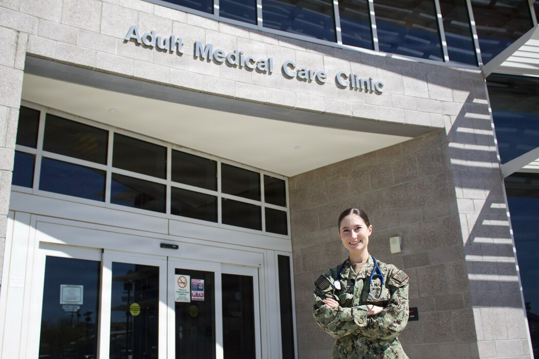 Hospitalman Chloe Gerimonte poses for a portrait outside the Adult Medical Care Clinic at Navy Medicine Readiness and Training Command Twentynine Palms aboard Marine Corps Air Ground Combat Center Twentynine Palms, California, April 1, 2026. Gerimonte previously worked at the clinic as a civilian contractor before answering the call to serve and joining the Navy Hospital Corps. (U.S. Navy photo by Hospital Apprentice Evelyn Zermeno, NH/NMRTC Twentynine Palms public affairs).