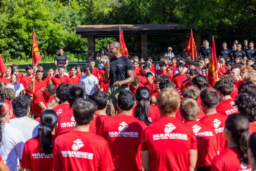 U.S. Marine Corps Maj. Cory Tribble, the commanding officer of Recruiting Station Chicago, addresses attendees during a pool function at the Ned Brown Forest Preserve in Rolling Meadows, Illinois, June 13, 2026. The pool function provided an opportunity for future Marines to build camaraderie and prepare for recruit training by competing in athletic competitions and attending military classes. (U.S. Marine Corps photo by Cpl. Maxwell Cook)